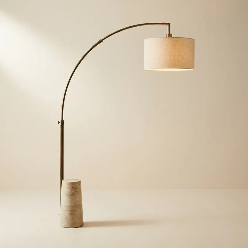 Calder brass arc floor lamp in Aged brass