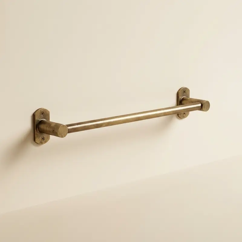 Calder brass towel rail in Aged brass