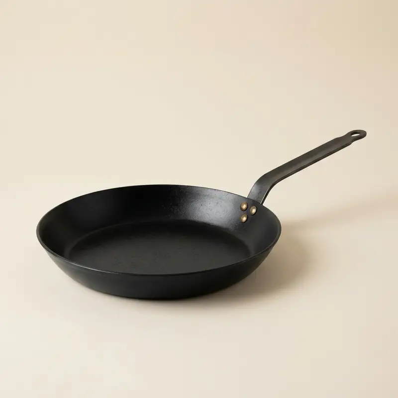 Wexley carbon steel skillet in Seasoned black